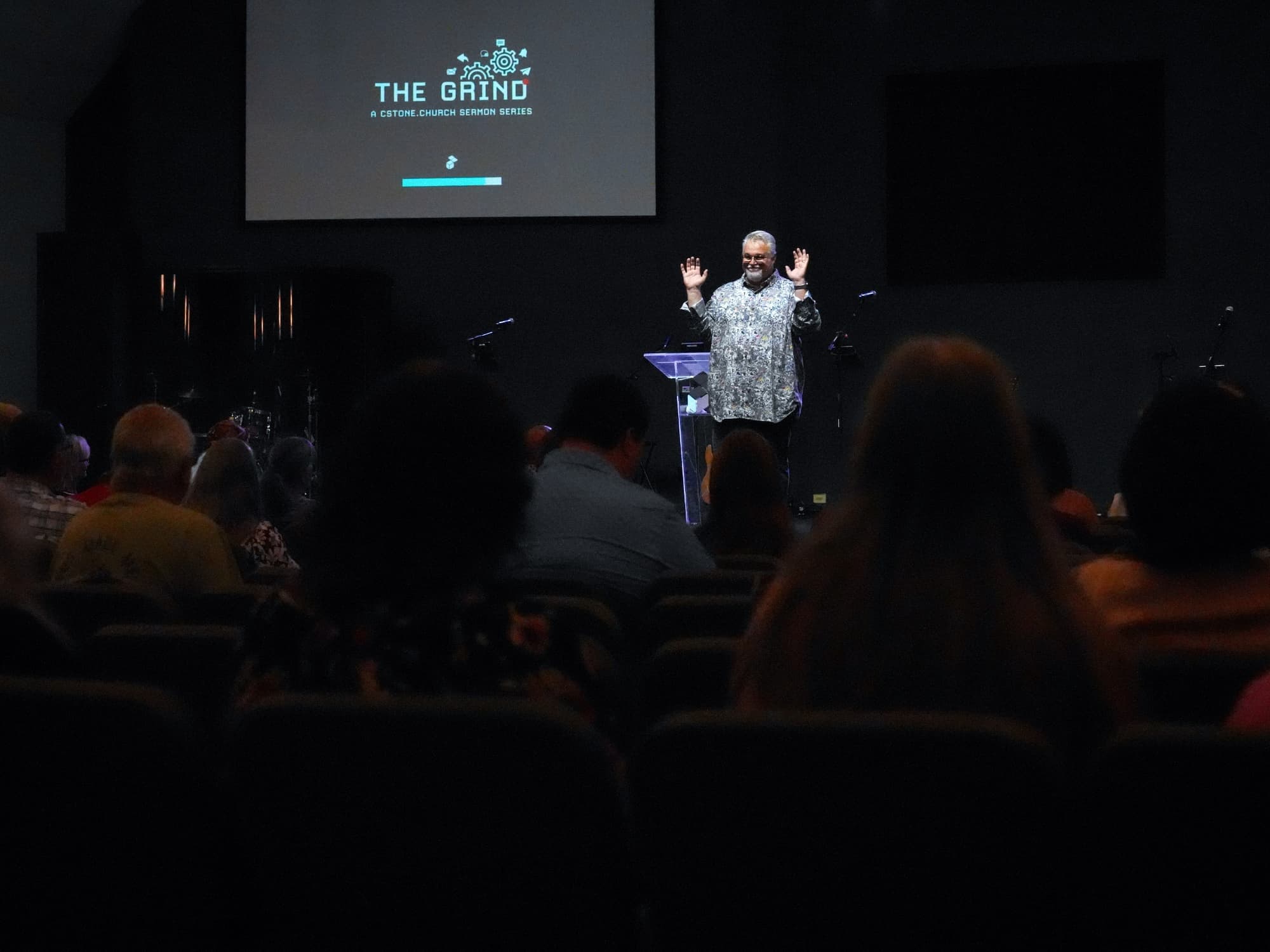Steve Stewart preaching to a full room at Cornerstone